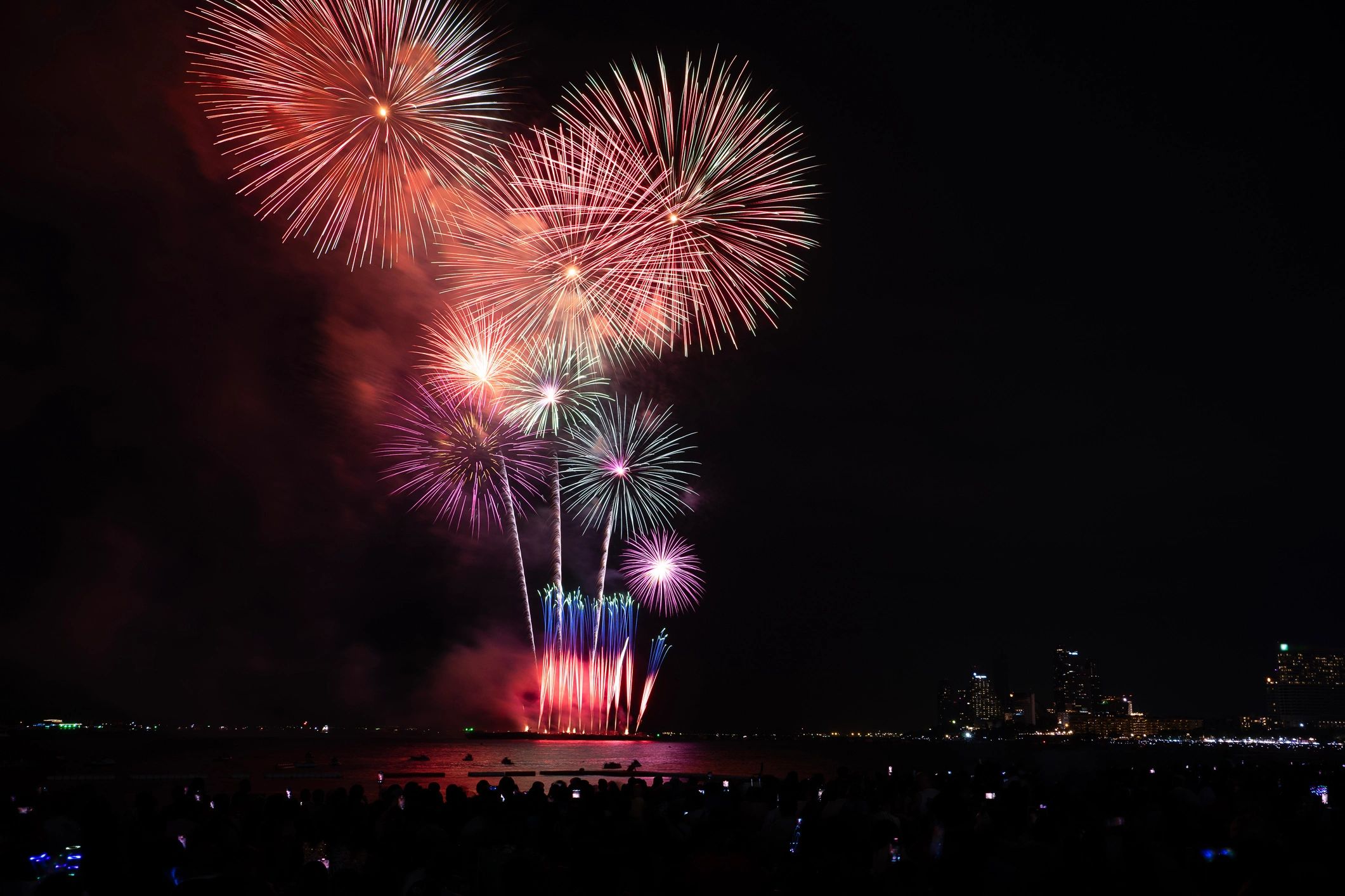 Colorful fireworks over an event venue